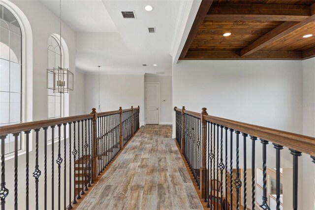 12245 Park Ave, Windermere, FL 34786 - corridor with light wood-type flooring, recessed lighting, beam ceiling, and baseboards