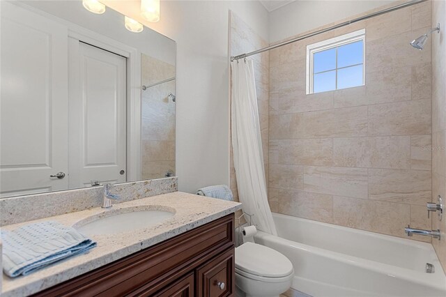 12245 Park Ave, Windermere, FL 34786 - bathroom with shower / bath combination with curtain, vanity, and toilet
