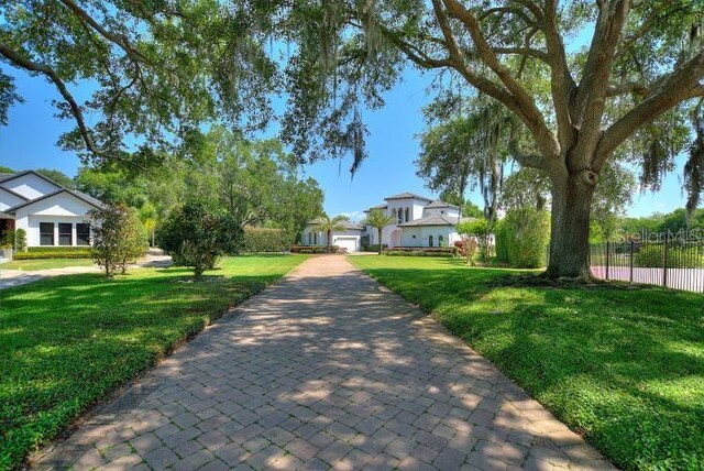 12245 Park Ave, Windermere, FL 34786 - view of front of house featuring driveway