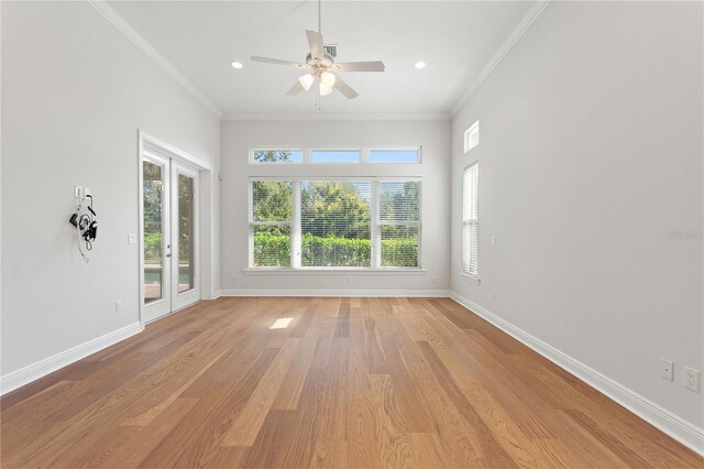 12245 Park Ave, Windermere, FL 34786 - empty room with crown molding, light wood finished floors, ceiling fan, baseboards, and recessed lighting