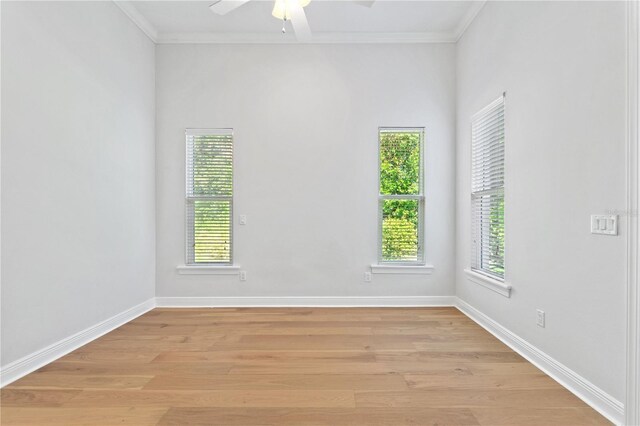 12245 Park Ave, Windermere, FL 34786 - unfurnished room with ornamental molding, a ceiling fan, light wood-type flooring, and baseboards