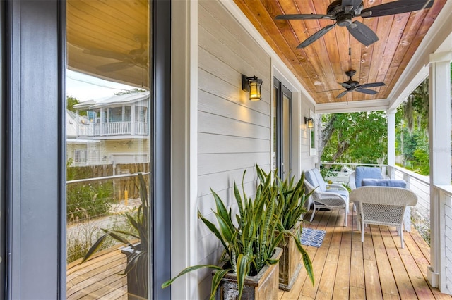 wooden terrace featuring a porch