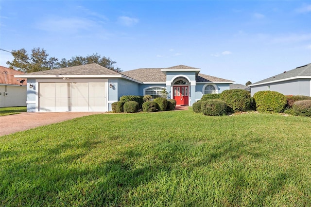 single story home with a garage and a front yard