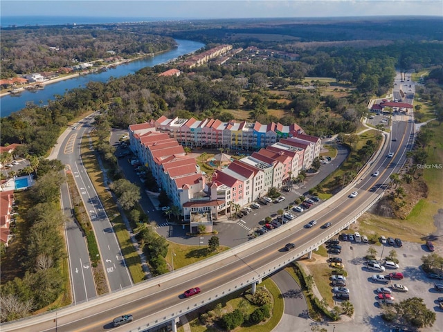 birds eye view of property featuring a water view