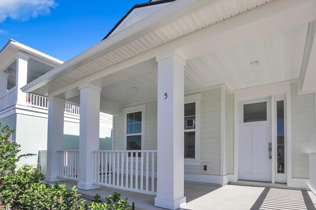 doorway to property with a porch