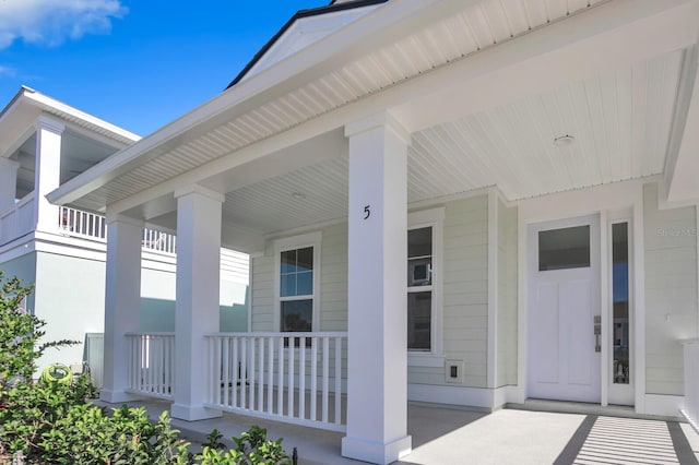 property entrance featuring covered porch