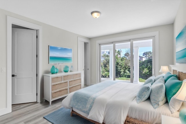 bedroom with light wood finished floors