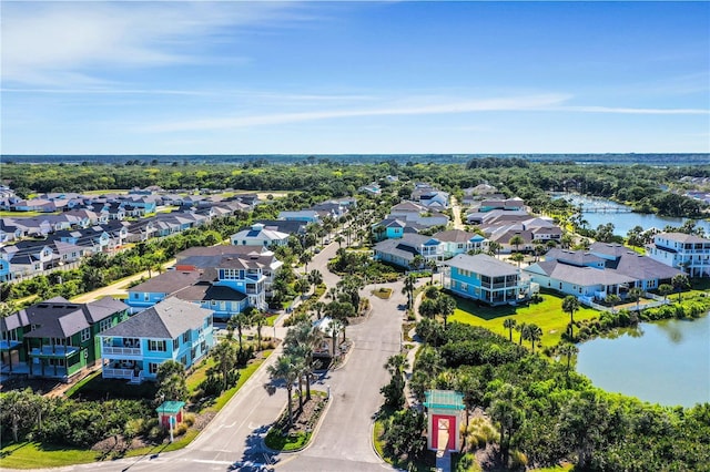 aerial view with a water view and a residential view