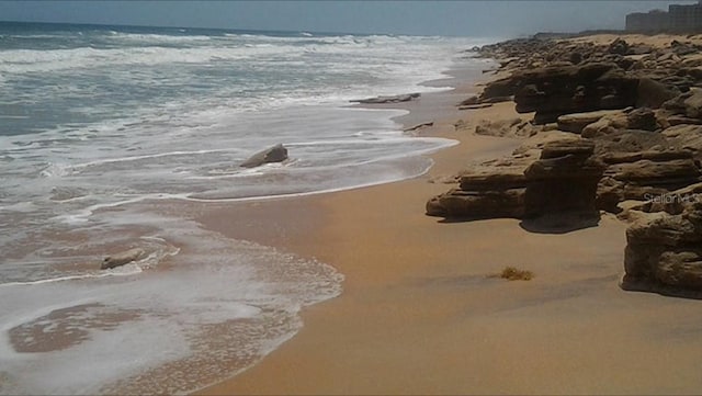 view of water feature with a view of the beach