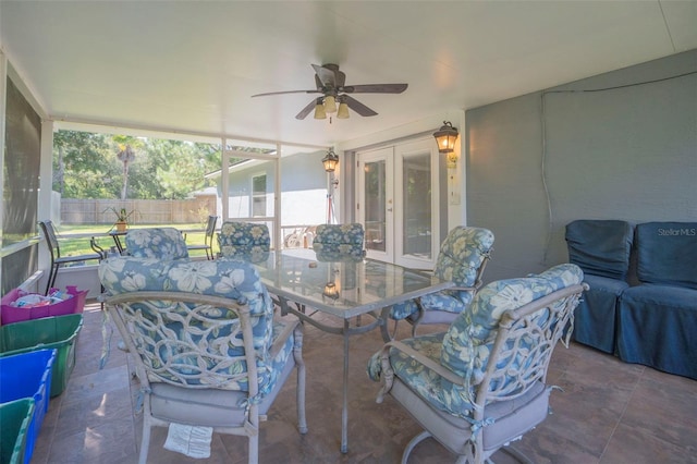 sunroom / solarium with french doors and ceiling fan