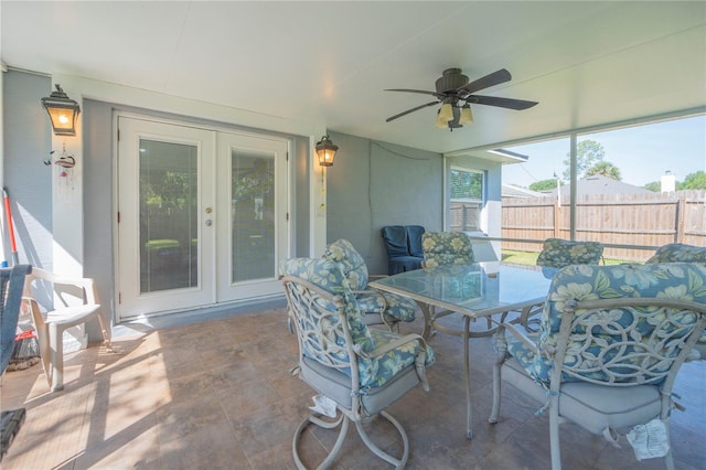 view of patio with french doors and ceiling fan