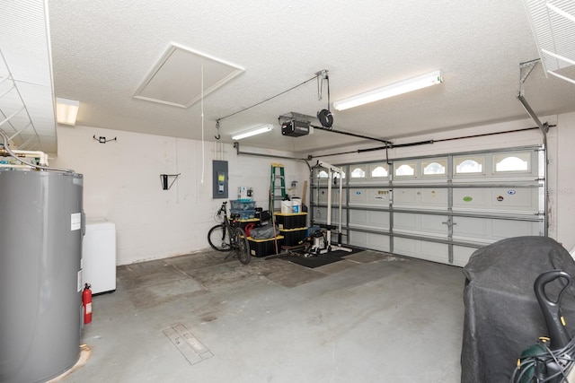 garage featuring water heater, a garage door opener, and electric panel