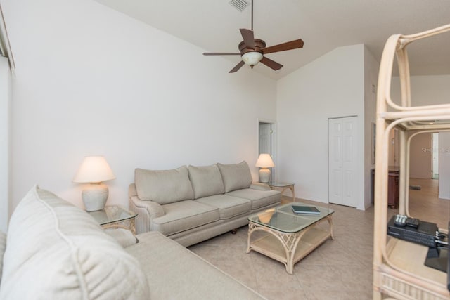 living room with high vaulted ceiling and ceiling fan