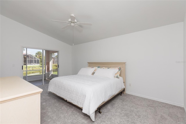 carpeted bedroom featuring vaulted ceiling, access to outside, and ceiling fan