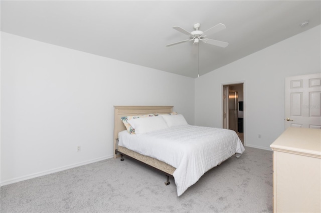 carpeted bedroom featuring lofted ceiling and ceiling fan