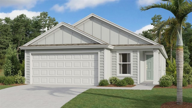 view of front of property featuring a garage and a front yard