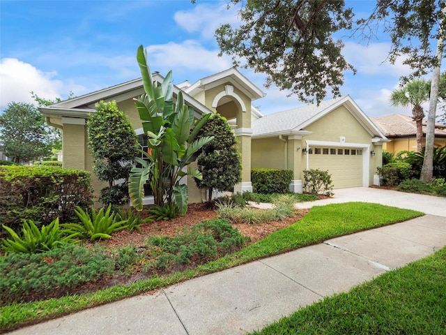 view of front of property with a garage