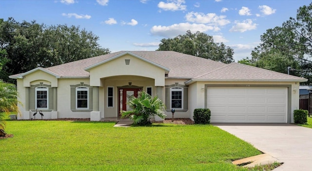 ranch-style home with a garage and a front lawn