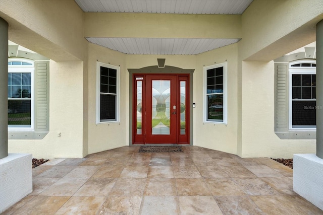 doorway to property featuring a patio