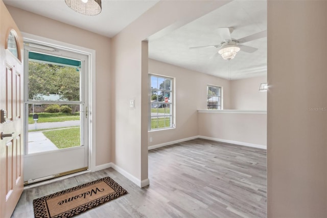 entryway featuring ceiling fan and light hardwood / wood-style flooring