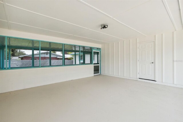 spare room with concrete flooring