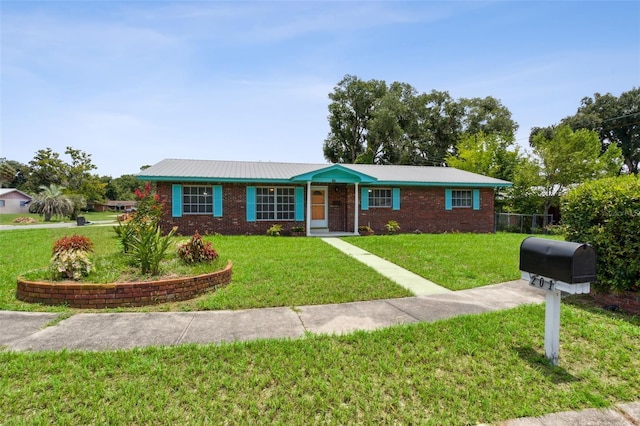 ranch-style house with a front yard