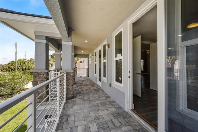 view of patio / terrace with a balcony