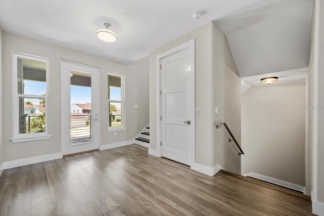 empty room featuring wood-type flooring