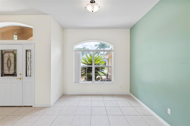 foyer featuring light tile patterned floors