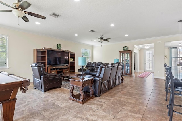 living room with tile patterned floors, billiards, ceiling fan, and crown molding