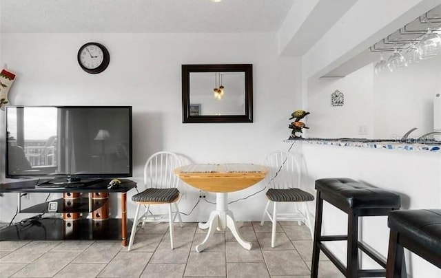 view of tiled dining space