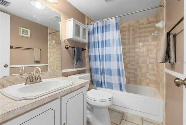 full bathroom featuring toilet, shower / tub combo, tile patterned flooring, and vanity