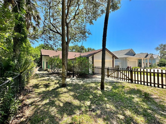 view of yard with a garage