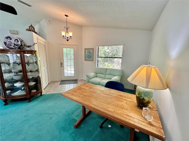 living room with high vaulted ceiling, a chandelier, tile patterned flooring, and a textured ceiling