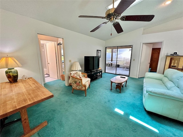 carpeted living room featuring ceiling fan and vaulted ceiling