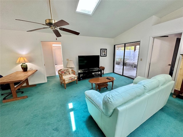 living room featuring carpet, lofted ceiling, and ceiling fan