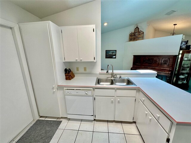 kitchen with sink, white cabinetry, dishwasher, and light tile patterned floors