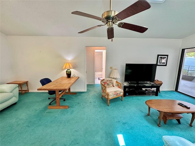 living room featuring carpet and ceiling fan