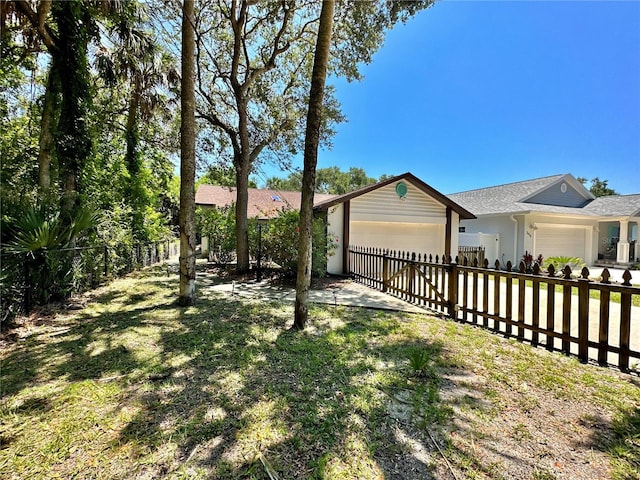 view of yard with a garage