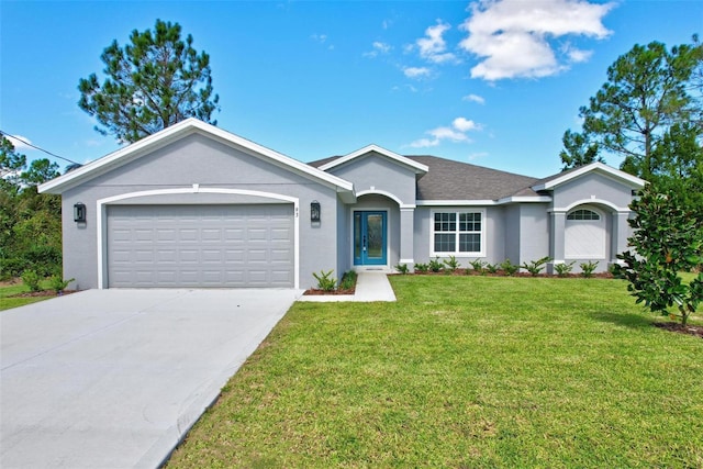 ranch-style home with a front yard and a garage