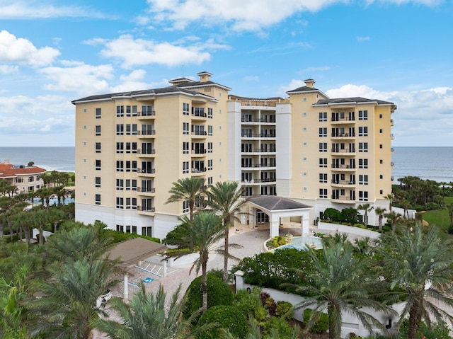 view of building exterior featuring a water view