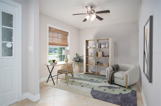 office featuring light tile patterned flooring and ceiling fan