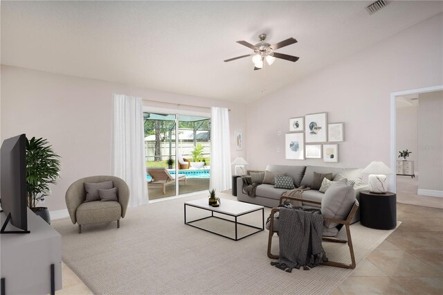 tiled living room featuring vaulted ceiling and ceiling fan