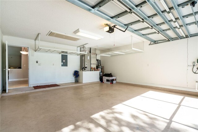 garage with heating unit, a garage door opener, electric panel, and water heater