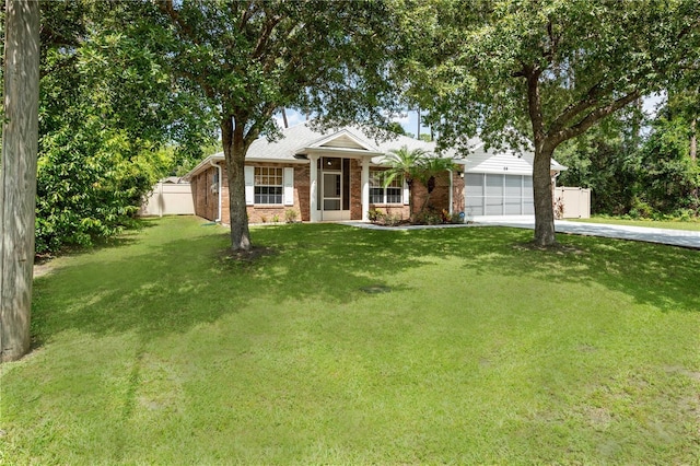 ranch-style house with a garage and a front lawn