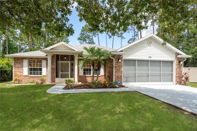 ranch-style house with a garage and a front lawn