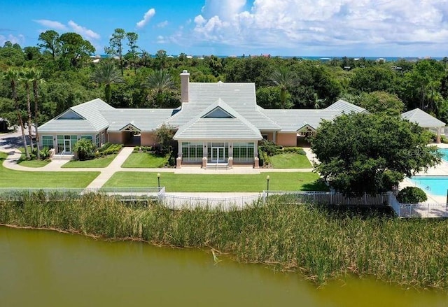 exterior space with a water view