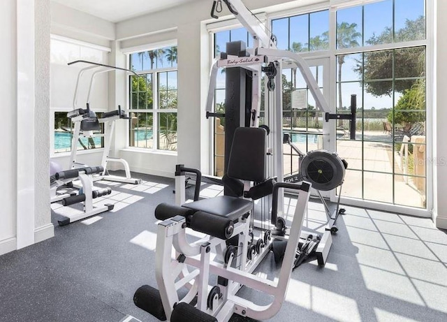 exercise room with baseboards