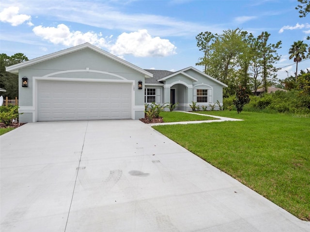 ranch-style home with a garage and a front lawn