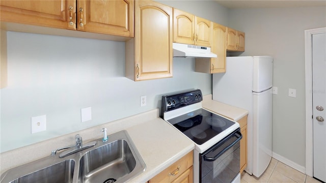 kitchen featuring electric stove, light countertops, light brown cabinetry, a sink, and under cabinet range hood